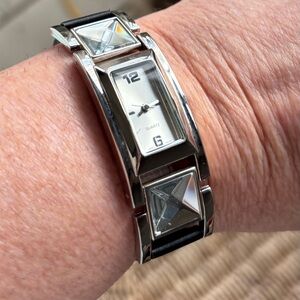 Women’s stylish, silver and black with rhinestones it was silver face tested